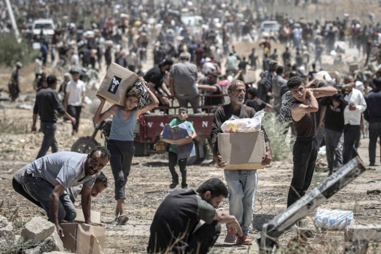 Controversial Gaza aid operation pauses for 24 hours after days of deadly shootings